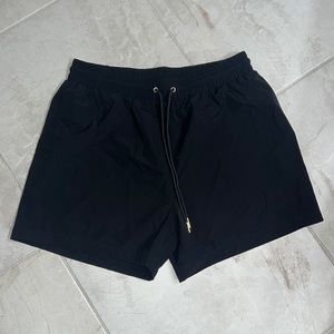 Riot Swim men’s black trunks